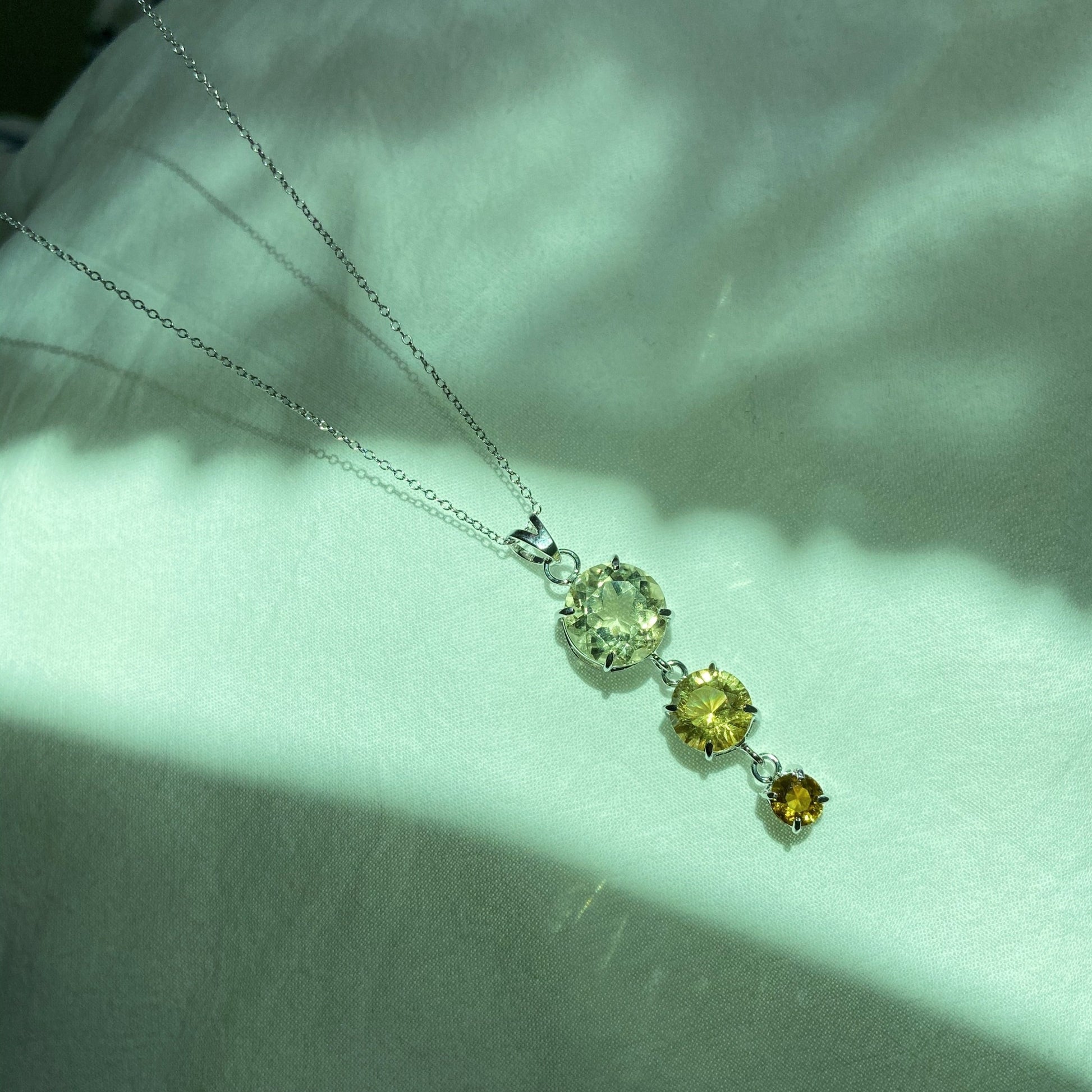 Handcrafted citrine and scapolite silver pendant