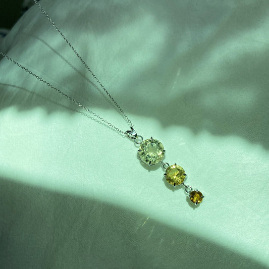 Handcrafted citrine and scapolite silver pendant