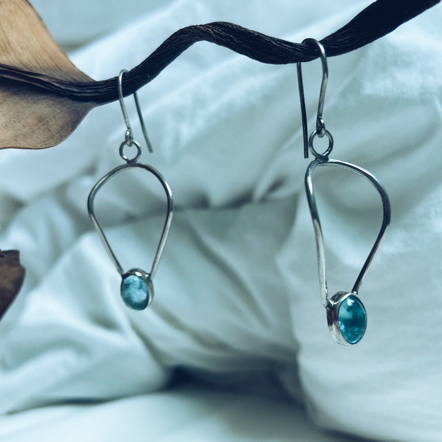 aquamarine cabochon silver dangle earrings