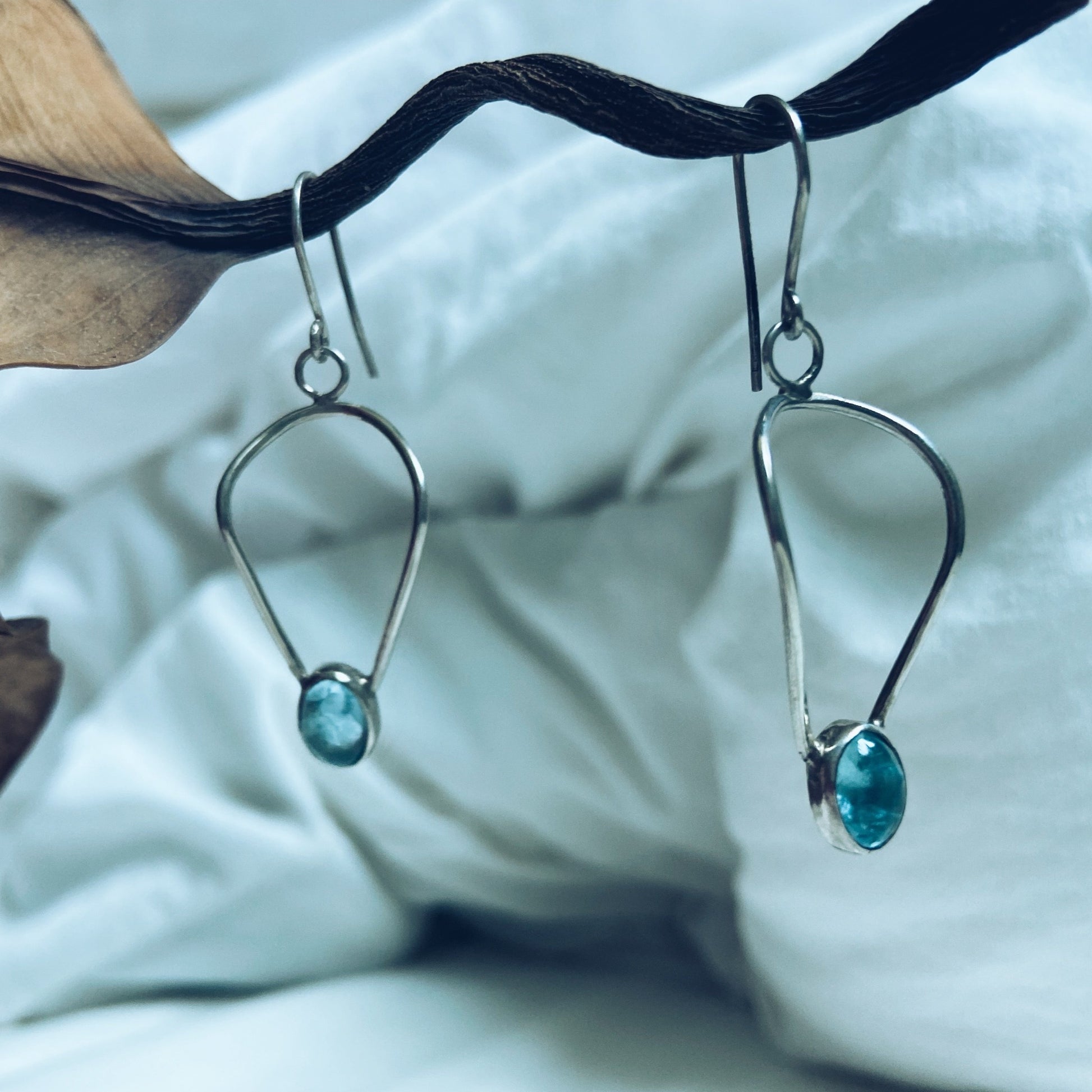 aquamarine cabochon silver dangle earrings