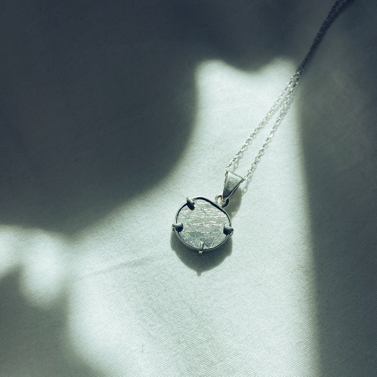 Vela | Petite Namibian meteorite silver pendant