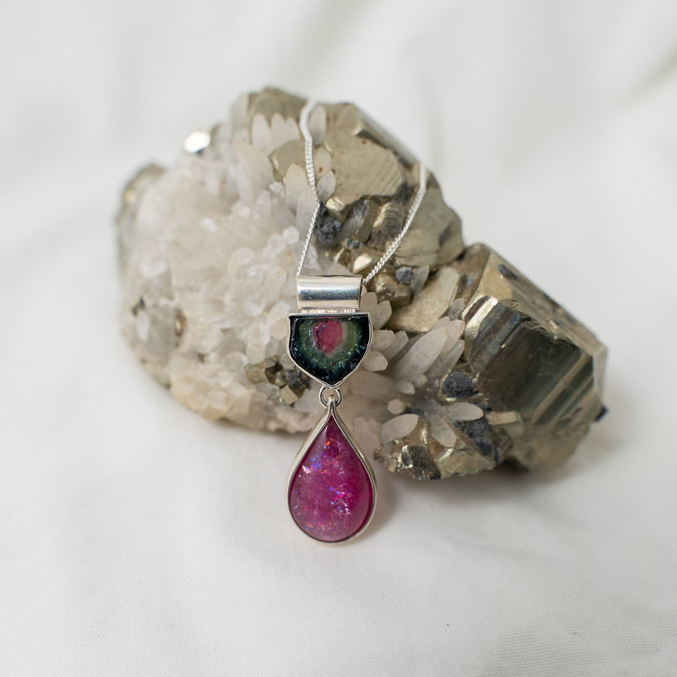 photograph of a handcrafted, rubellite and watermelon tourmaline necklace in silver 
