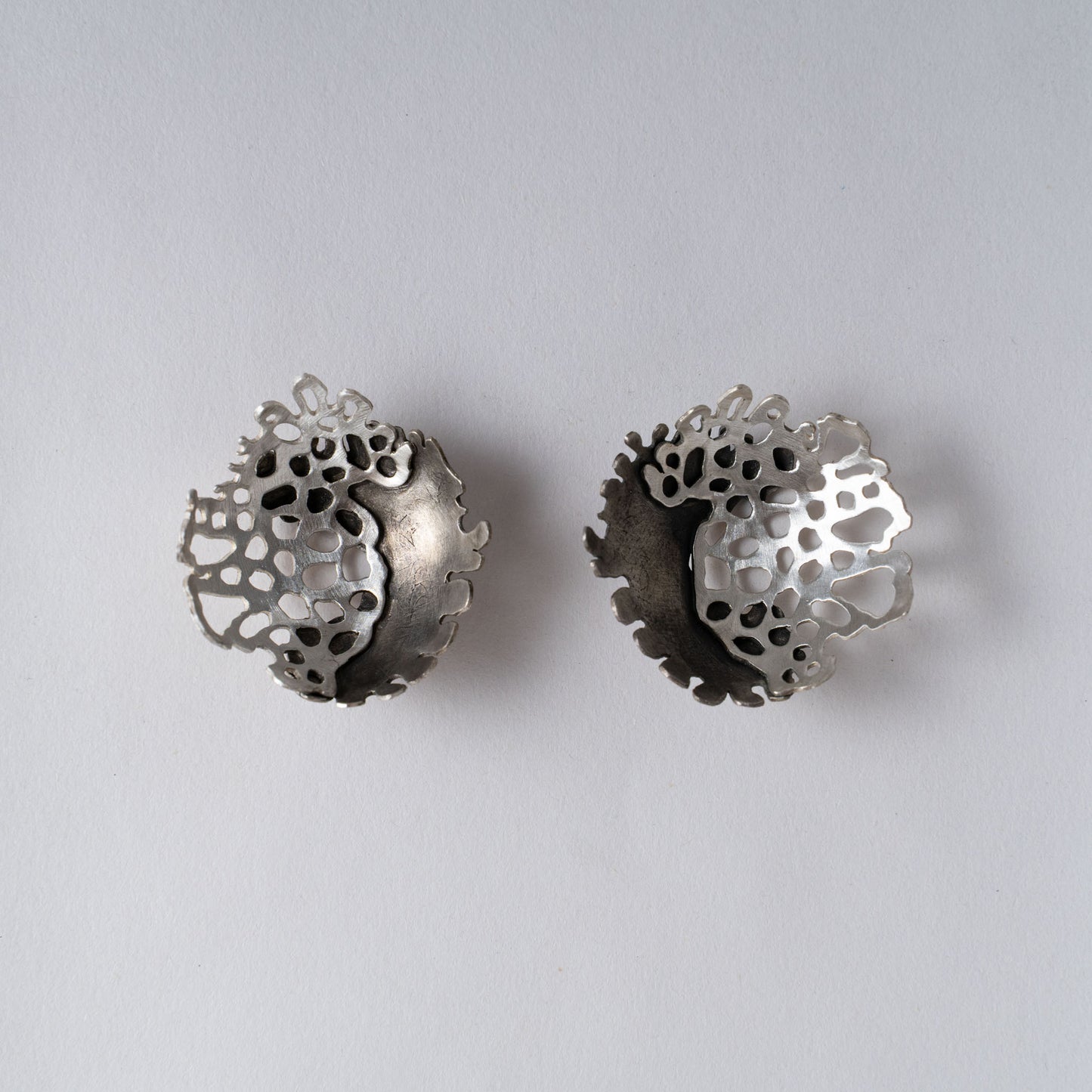 An ode to  Montipora Peltiformis  - oxidized and matte finish brass earrings, available for custom order in gold and silver