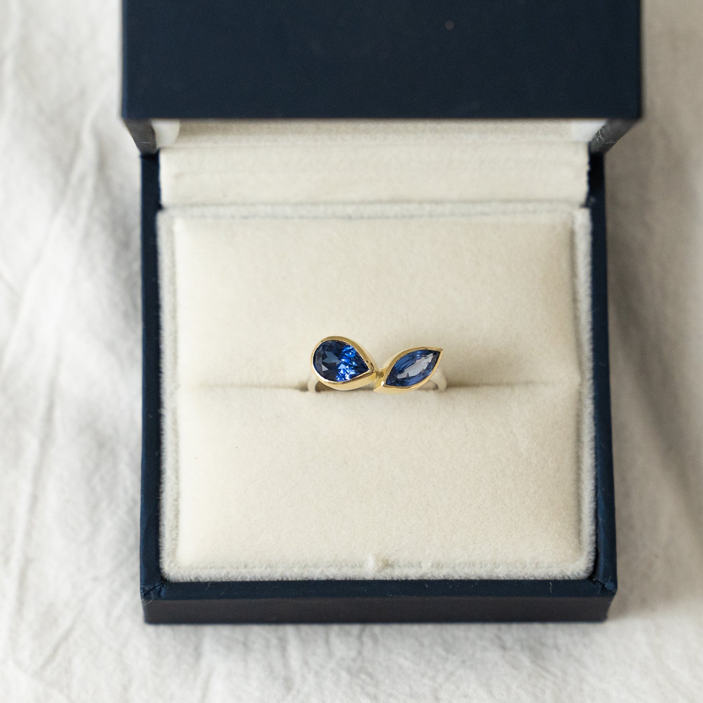 Toi et Moi double sapphire engagement ring in 18k gold and silver.