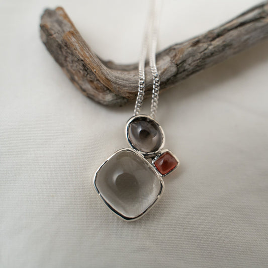 quartz, smokey quartz and garnet silver pendant