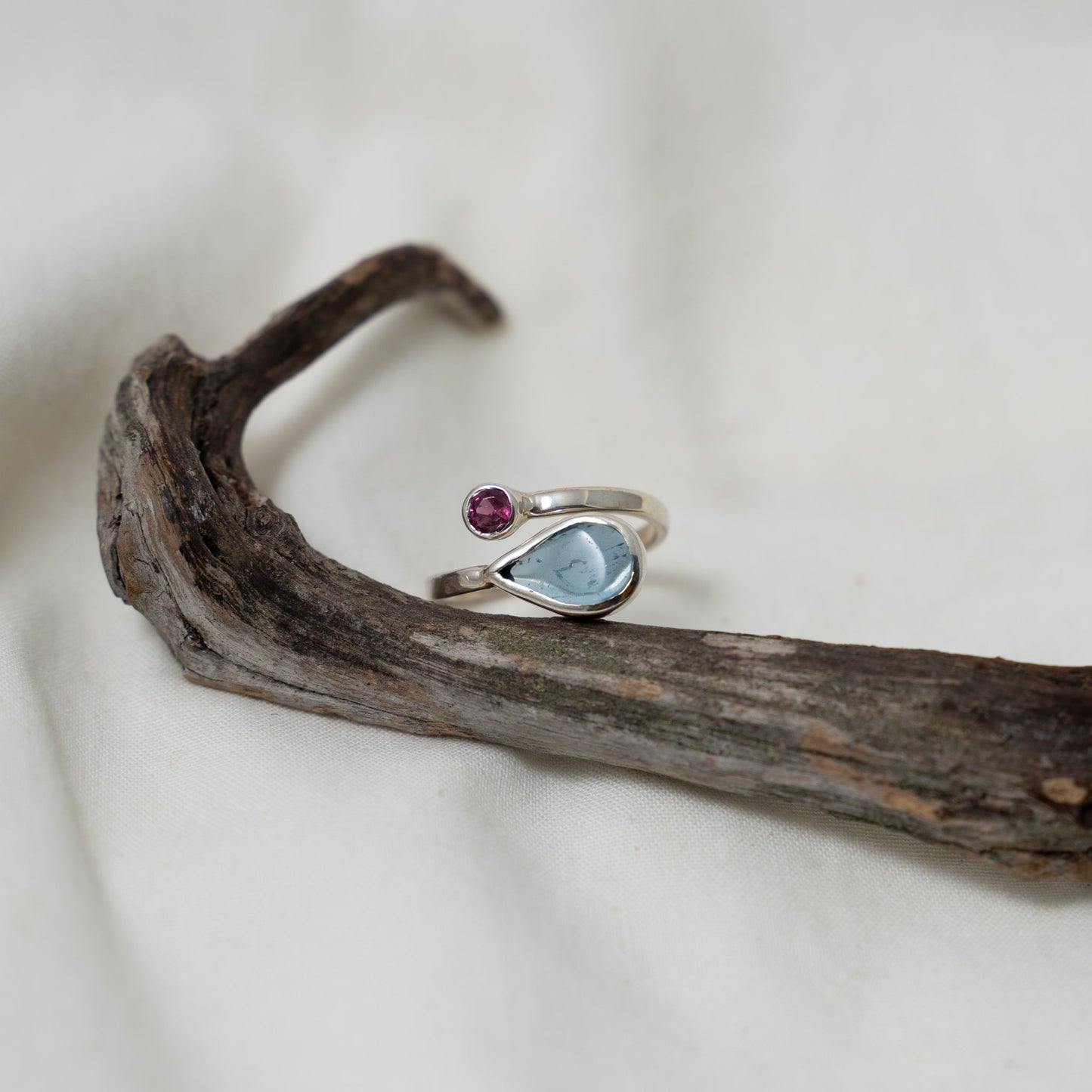 Aquamarine and rhodalite open silver ring
