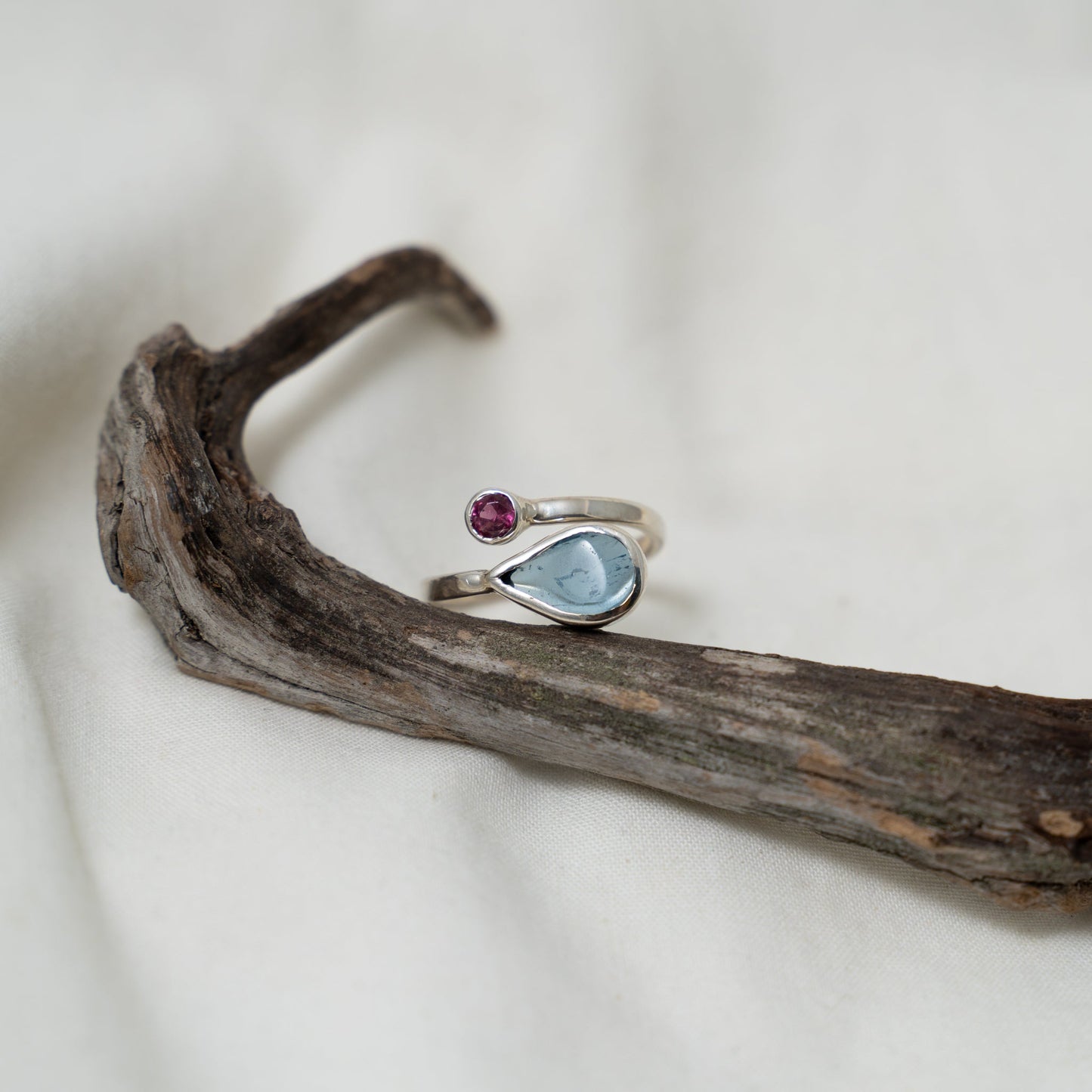 Aquamarine and rhodalite open silver ring