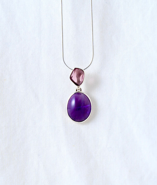 Handcrafted Amethyst and Pink Tourmaline Pendant: Elegant Gemstone Contrast